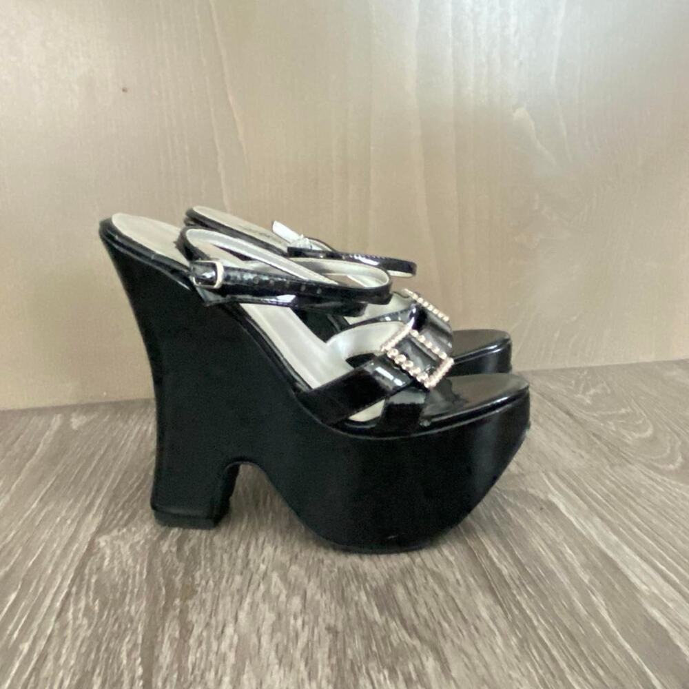 Black patent leather open toe platforms